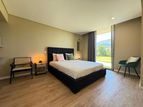 Postel nebo postele na pokoji v ubytování Perral Nature - Casa da Oliveira - Gerês