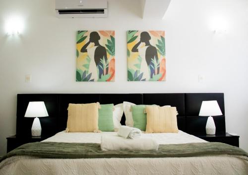 Llit o llits en una habitació de Ocean Blue Isla de Margarita