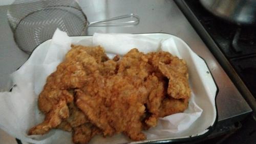 a basket of fried food sitting on a counter at La Polcura Lodge Turismo -Fishing Lodge & Spa in El Llano