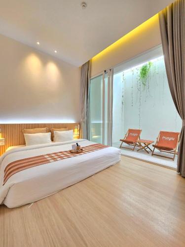 Cama o camas de una habitación en Punn Hotel Korat