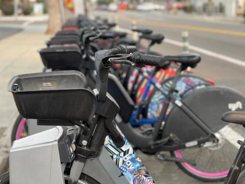 a row of bikes parked next to a street at Brand New Guest Suite + Full Kitchen + Parking in San Jose