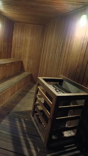 an empty sauna with wooden walls and a wooden floor at Hotel Nacional Rio in Rio de Janeiro