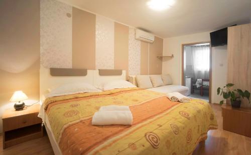 Кровать или кровати в номере Guest Accomodation Žura