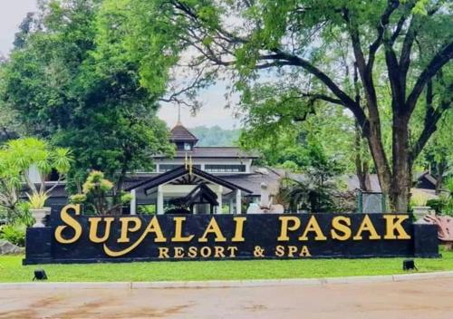 a sign in front of a resort and spa at Supalai Pasak Resort Hotel And Spa in Kaeng Khoi
