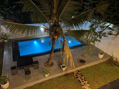 Πισίνα στο ή κοντά στο Villa Leo hikkaduwa