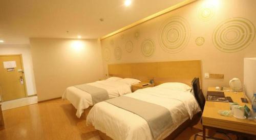 Katil atau katil-katil dalam bilik di GreenTree Inn Hefei Huaxia International Chabocheng Branch