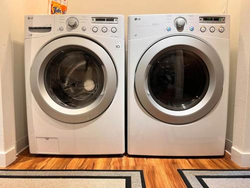 two washing machines are sitting next to each other at 3br Home In Valley - King Beds & Bunk Beds in Mendenhaven