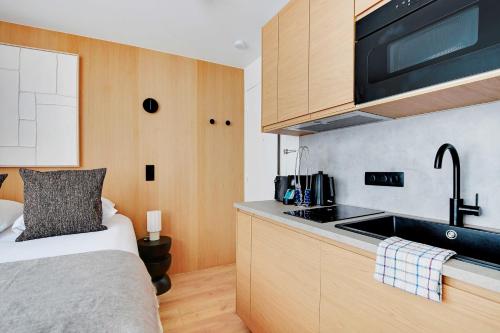 Η κουζίνα ή μικρή κουζίνα στο Charming Studio 2P - Place de la République