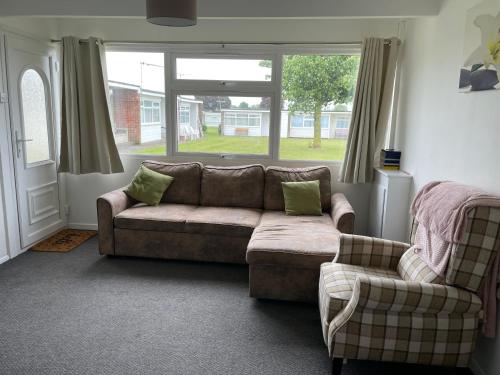 Et opholdsområde på Two Bedroom Chalet