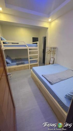 Postel nebo postele na pokoji v ubytování Tabing Ilog Resort and Events Place