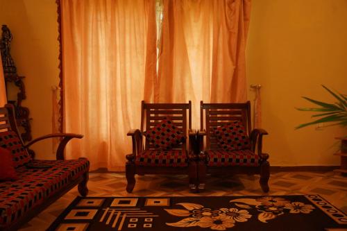Χώρος καθιστικού στο Willostays Cloudhill ooty