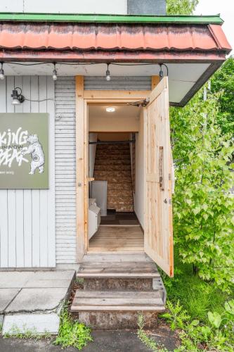 an open door to a building with a ramp at King Deer in Higashikawa