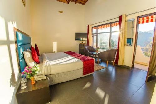 Ένα ή περισσότερα κρεβάτια σε δωμάτιο στο Hotel Vaapi Comfort inn