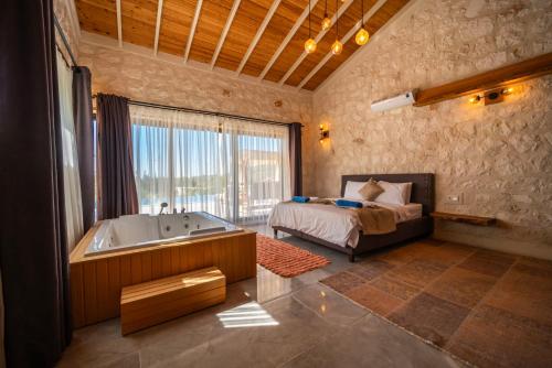 Ένα ή περισσότερα κρεβάτια σε δωμάτιο στο Eco Villa Su