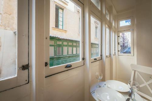 Ένα μπάνιο στο Charming 2-Bedroom in the Heart of La Valletta