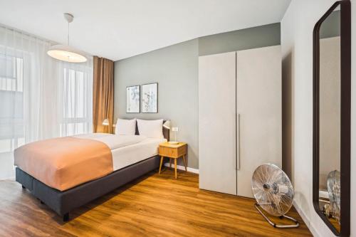 Limehome Chemnitz Kirchgässchenにあるベッド