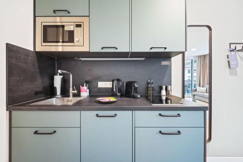 Limehome Chemnitz Kirchgässchenにあるキッチンまたは簡易キッチン
