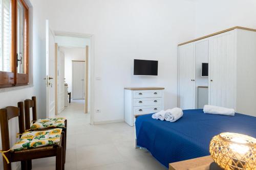 Voodi või voodid majutusasutuse Brezza Marina toas