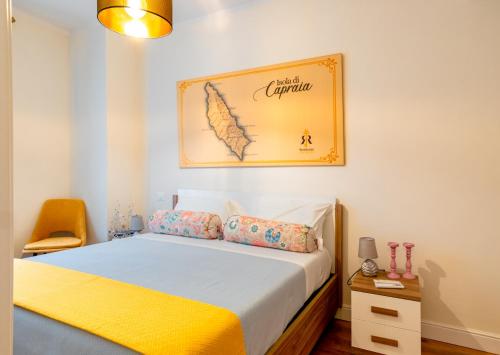 Ένα ή περισσότερα κρεβάτια σε δωμάτιο στο B&B Residenza Ricasoli Grosseto centro storico