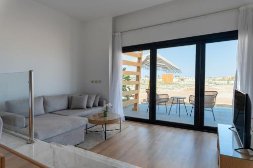 Χώρος καθιστικού στο Stayr Somabay - Bay Life Home Rentals