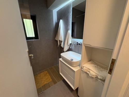 Ένα μπάνιο στο Melisma 1 Cosy Residence HomeSH