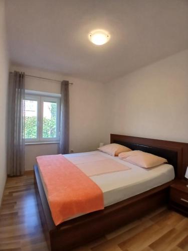 Katil atau katil-katil dalam bilik di Apartment Luka