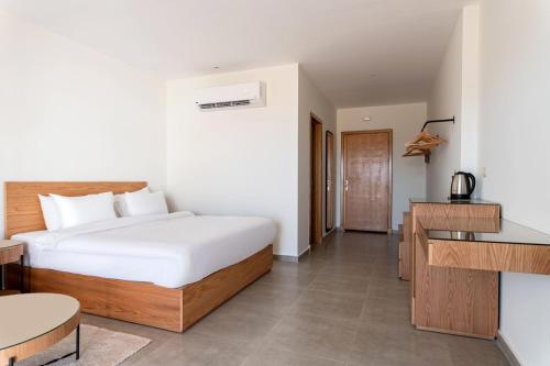 Ένα ή περισσότερα κρεβάτια σε δωμάτιο στο Stayr Somabay - Bay Life Home Rentals