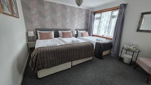 Ένα ή περισσότερα κρεβάτια σε δωμάτιο στο Skye Accommodation