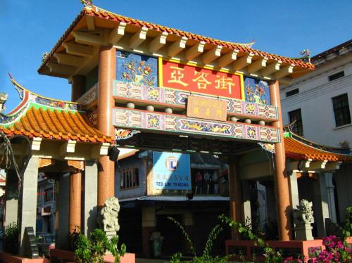 a building with a sign in front of it at LoFF Suite River View 2 Bedroom at Kuching Riverine Resort in Kuching