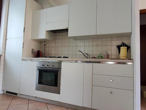 Kuchyň nebo kuchyňský kout v ubytování Residenza La Rocca