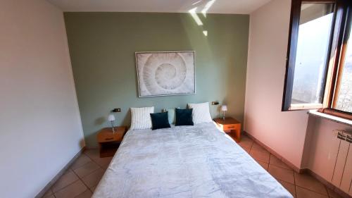 Postel nebo postele na pokoji v ubytování Residenza La Rocca