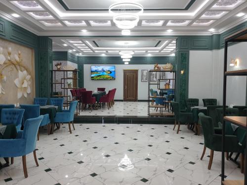 Μια τηλεόραση ή/και κέντρο ψυχαγωγίας στο Jayhun Hotel Urgench