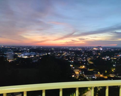 a view of a city skyline at night at Majestic Sanctuary Homestay Taiping with Netflix - 2 Carpark in Taiping