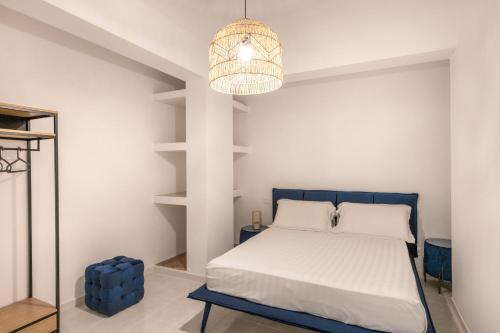 Ένα ή περισσότερα κρεβάτια σε δωμάτιο στο Sea Frame Design Apartments with Pool by Wonderful Italy