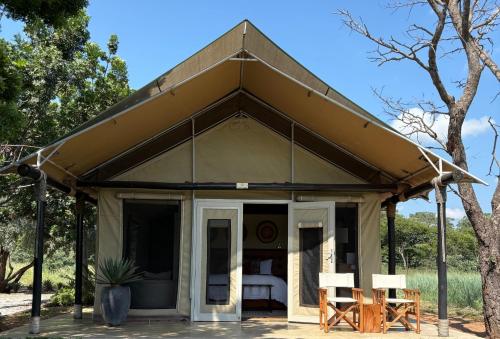 a small house with a pitched roof at Die Boskamp Self-Catering Bush Retreat in Marble Hall