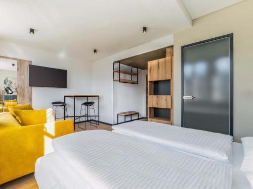 Katil atau katil-katil dalam bilik di B&B HOTEL Albstadt-Hbf