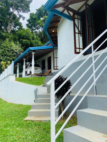 a set of stairs leading up to a house at Nimneth Villa 