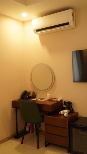 TV a/nebo společenská místnost v ubytování The Star Hotel 2