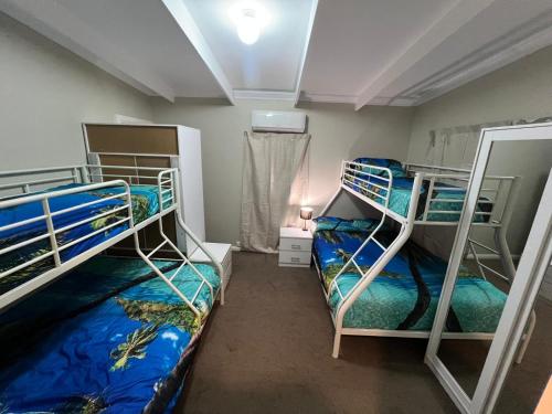 Giường trong phòng chung tại Happy Haven Lodge II Private Double Room for Couple, Cozy Shared Apartment for Female only