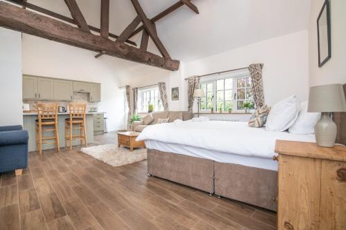 Ένα ή περισσότερα κρεβάτια σε δωμάτιο στο Charming Warwickshire Studio