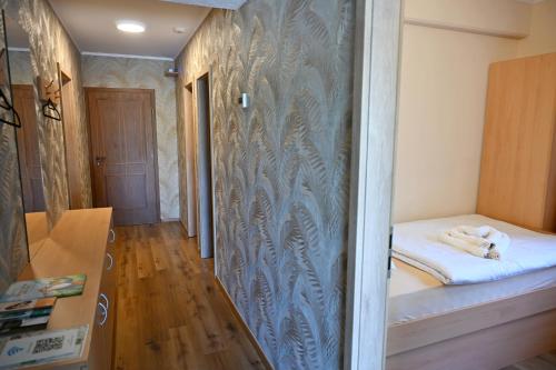 Postel nebo postele na pokoji v ubytování Sobe in apartma Portus