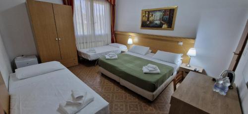 Letto o letti in una camera di Hotel Tito Venice
