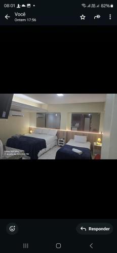 Una cama o camas en una habitación de Royal Flat ' Hotel, unidade nº 204
