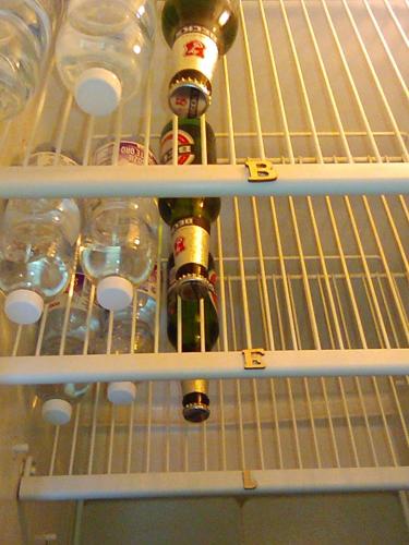 two bottles of wine are in a refrigerator at B&B 'Tra i due Parchi'' in Avezzano