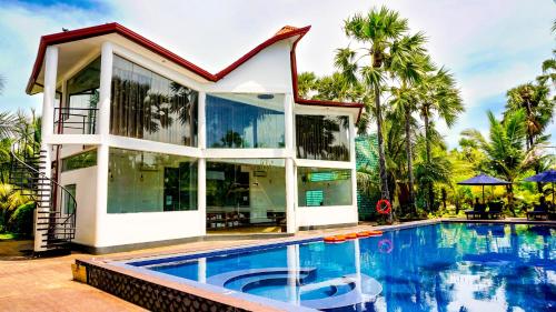 Bazén v ubytování ReeCha Kurinji Resort nebo v jeho okolí