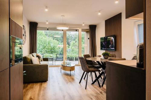 R&J apartmányにあるテレビまたはエンターテインメントセンター