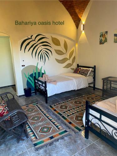 Ένα ή περισσότερα κρεβάτια σε δωμάτιο στο Bahariya Oasis hotel