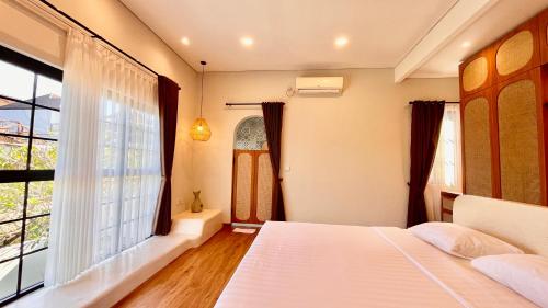 Katil atau katil-katil dalam bilik di The BALIem Villa