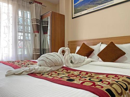 Cama o camas de una habitación en Unique Inn