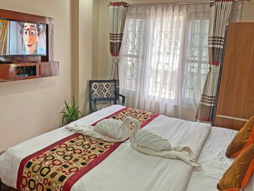 Cama o camas de una habitación en Unique Inn
